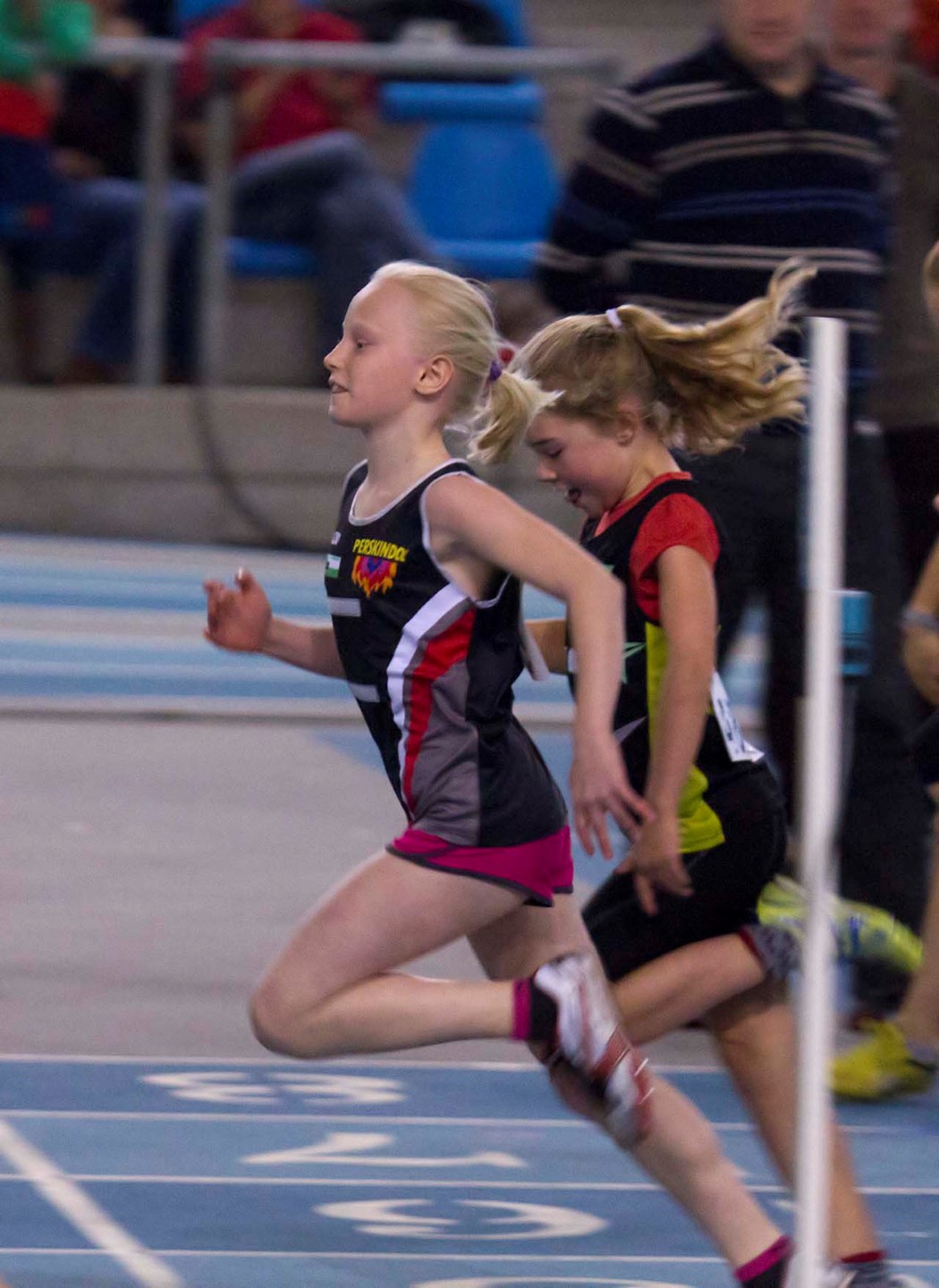 the two girls are racing their own lap