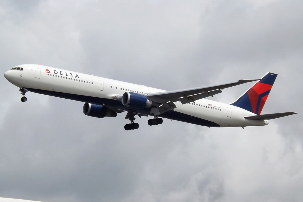 a delta plane taking off from the runway