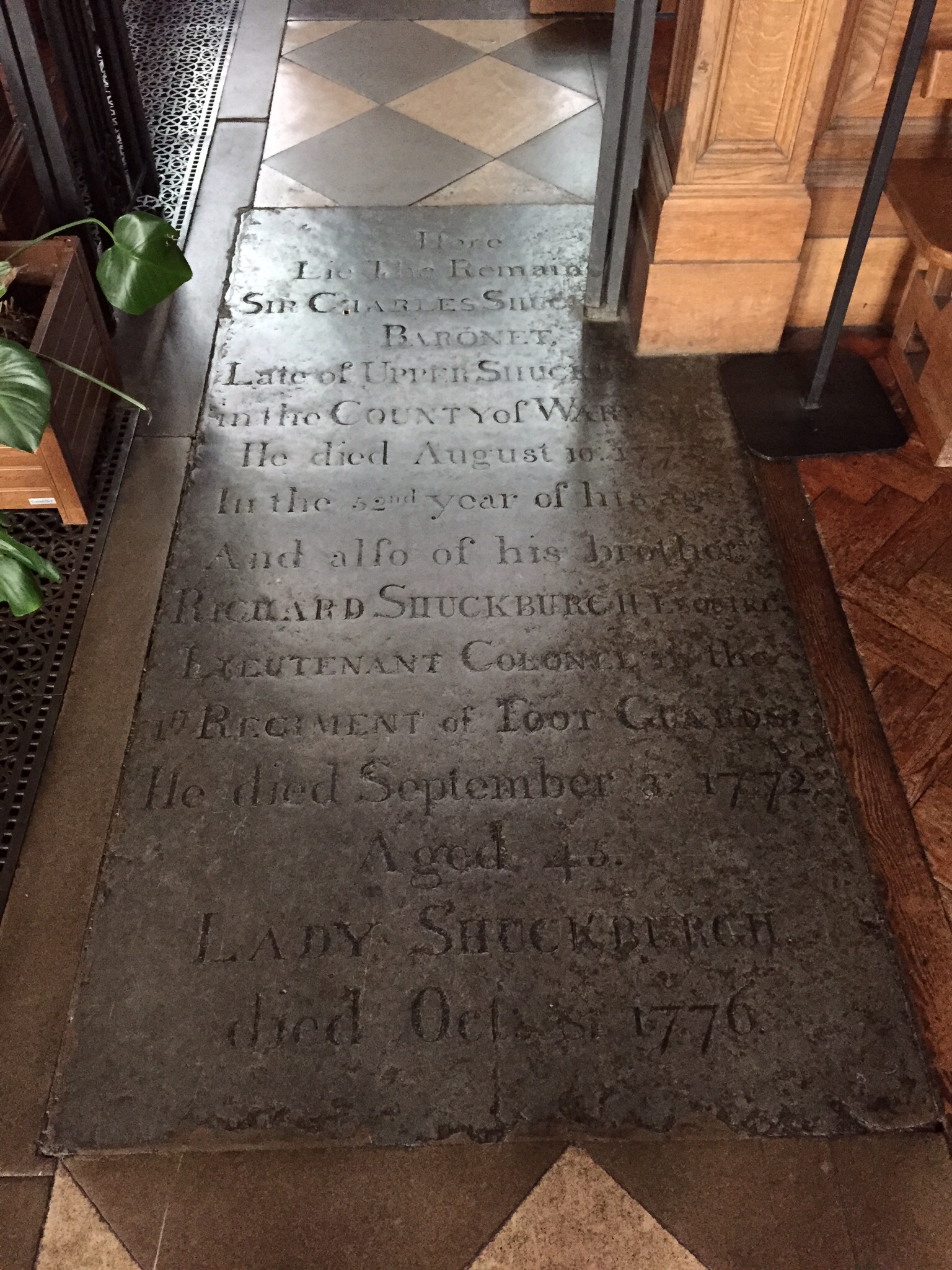 a carpet with writing on it and a doorway