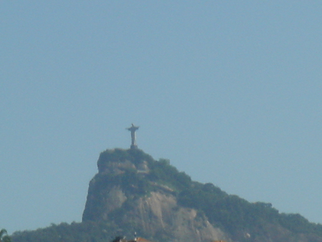 view of the christ statue in the background, from atop a hill