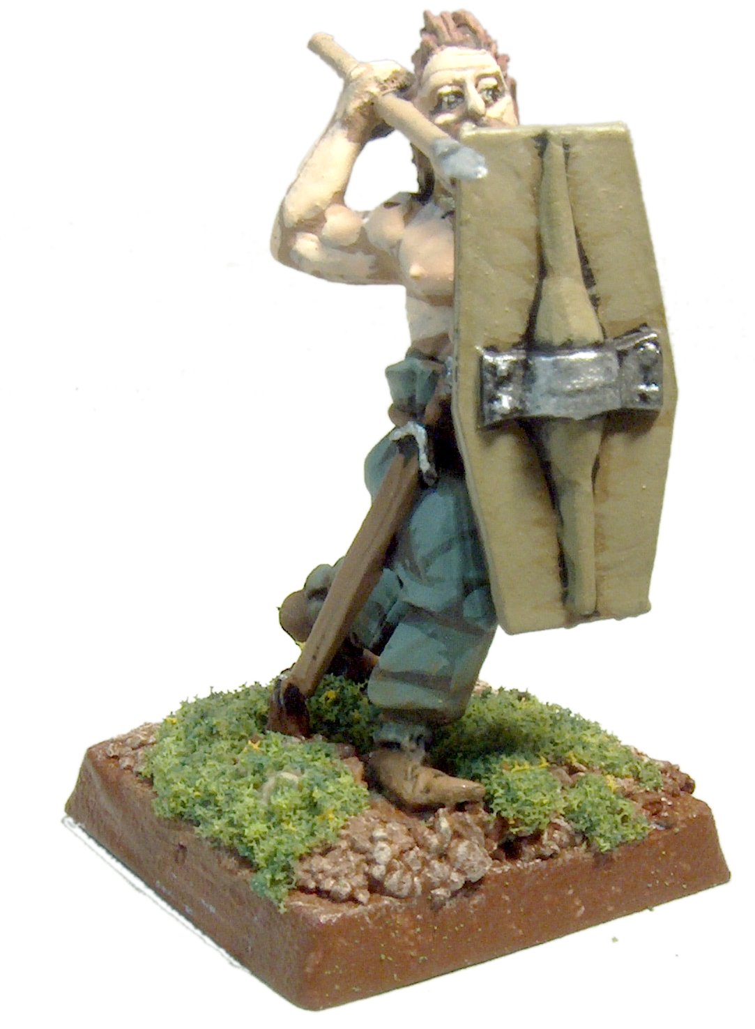 figurine of a soldier holding a sword and shield