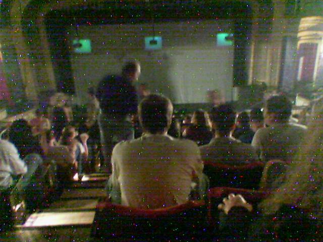 the audience is waiting for the performers at the event