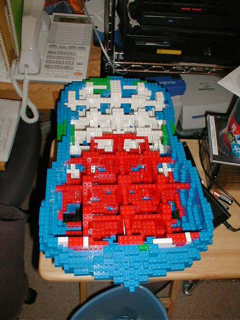 a red and blue table with wires on it