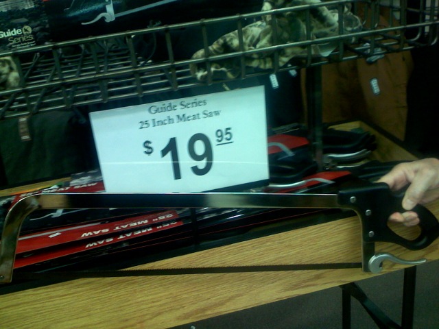 a rack of shoes has a sign with an inch sale number