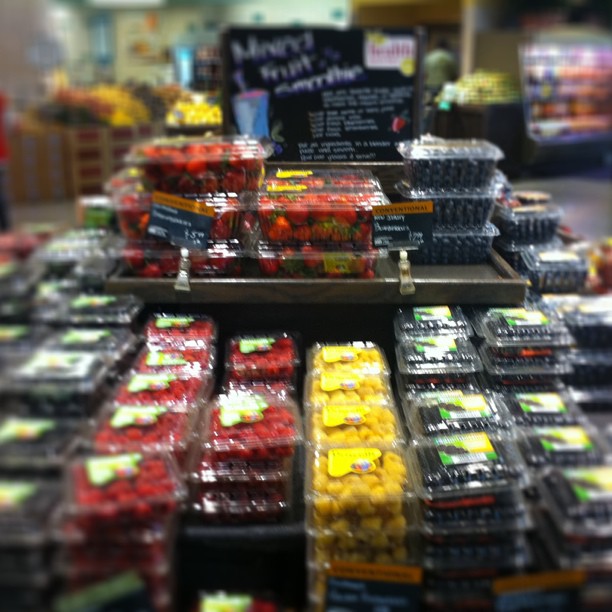 various fruit on display at a grocery store