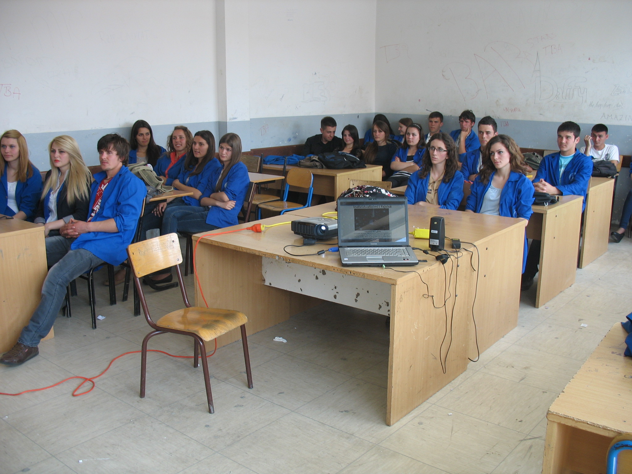 a group of students sitting in a classroom