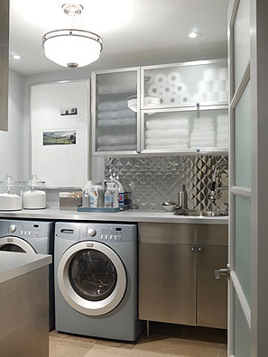 a po looking in into a laundry room with a washing machine