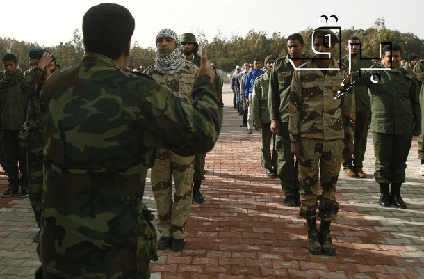some soldiers are standing on the brick floor and some people