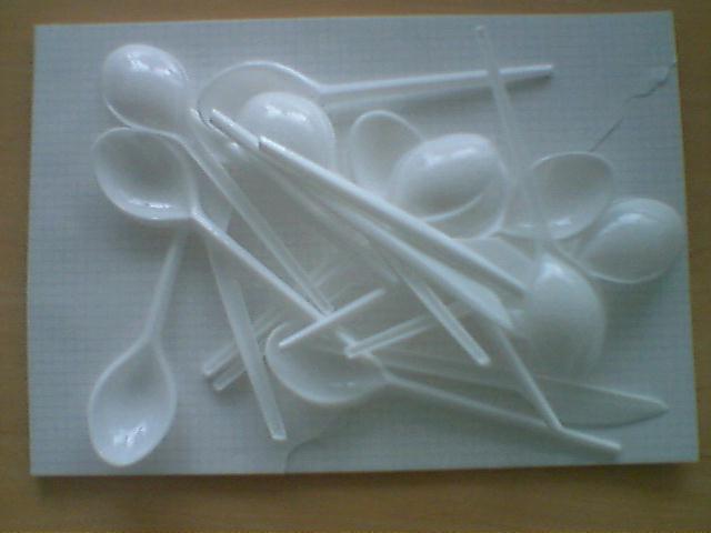 spoons and spoon rest on a napkin for food