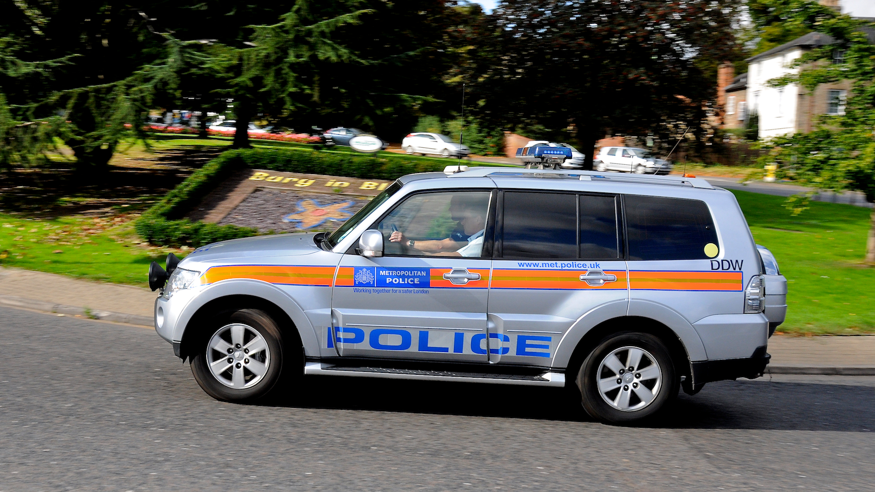 a vehicle that is driving down the road