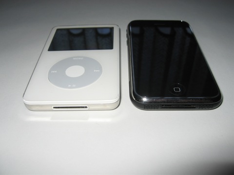 an ipod that is connected to a small device