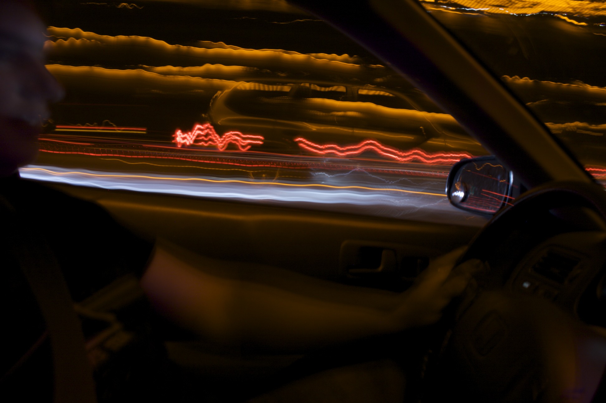 cars driving down the highway with long exposure in motion