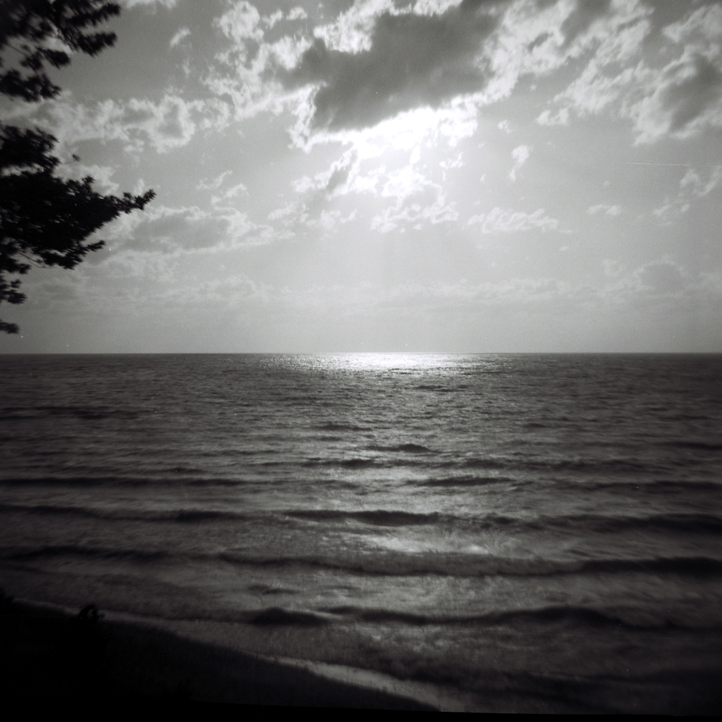 a very peaceful day on the ocean with some clouds