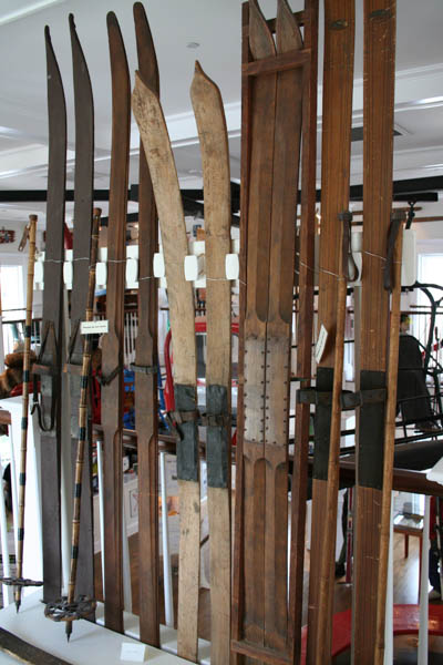 a room with some skis hanging on the wall