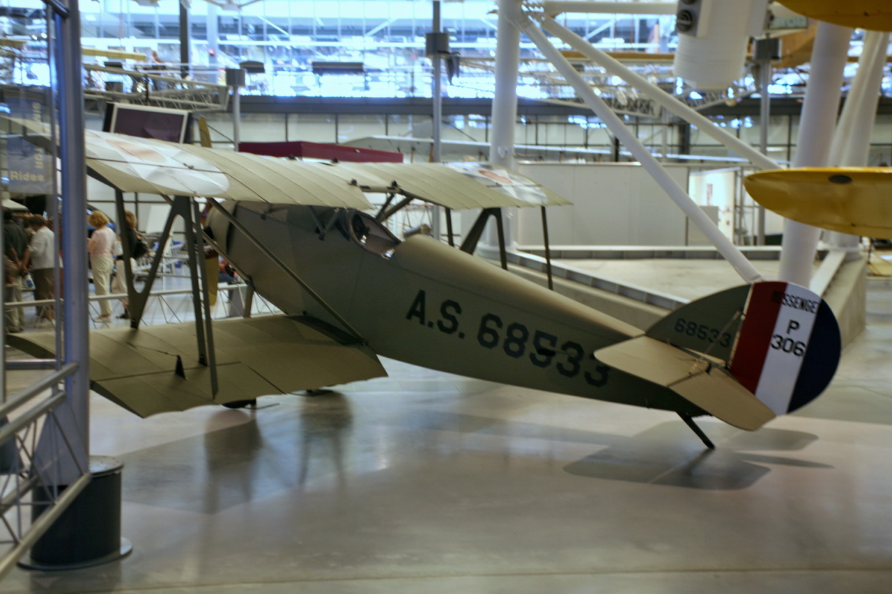 an old world war i airplane sits in a museum