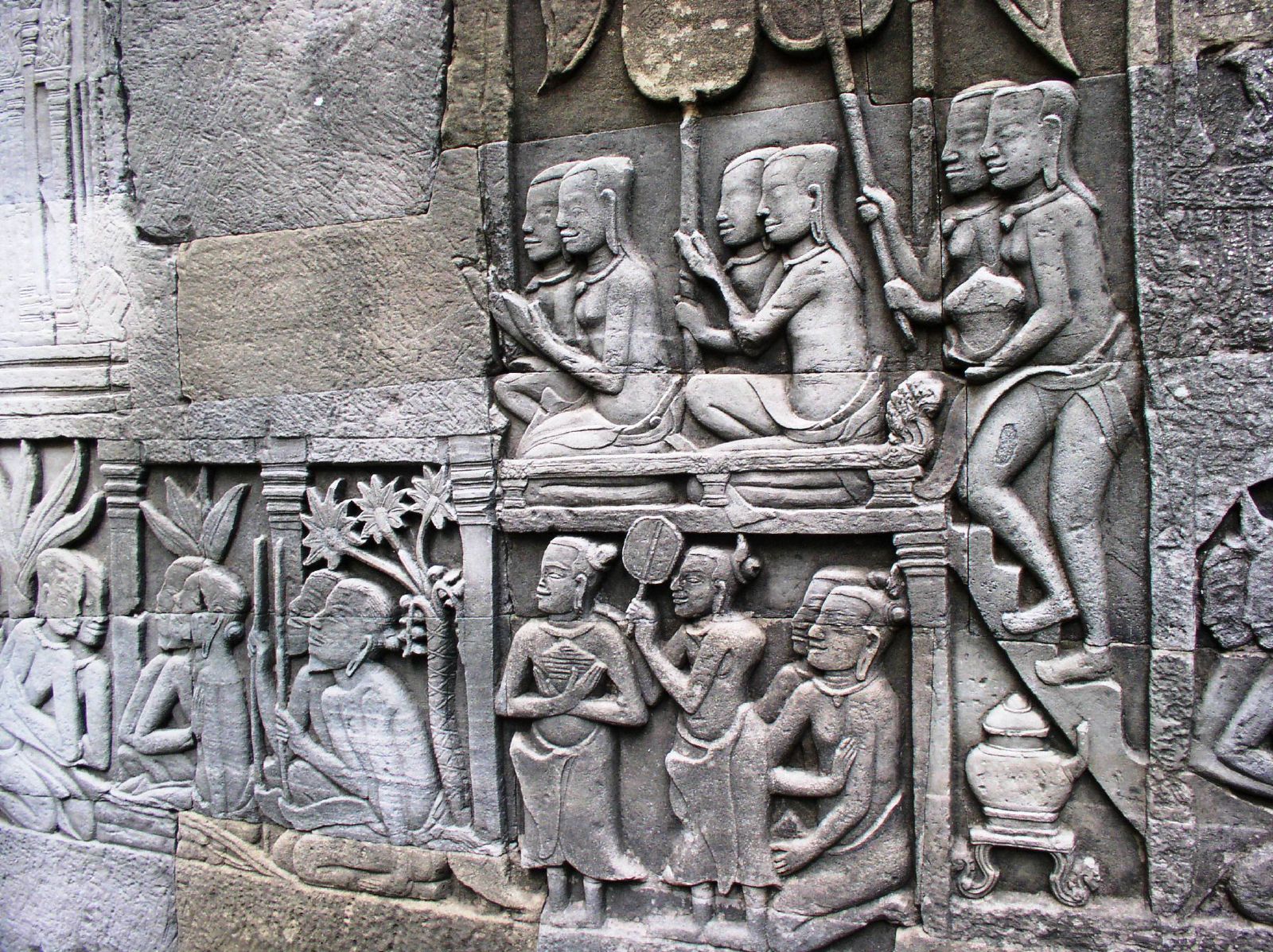 bas relief of ancient indian food being served to men