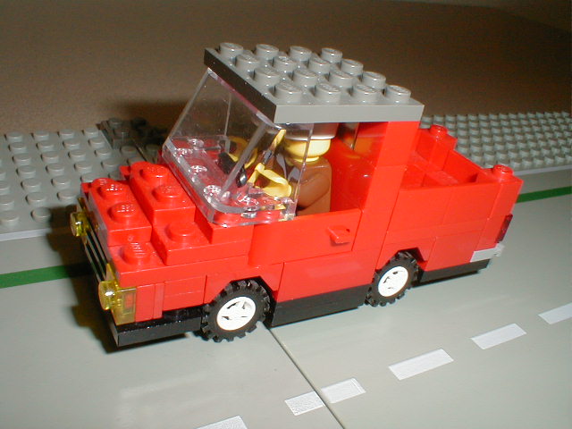 a fire truck in legos with it's door open