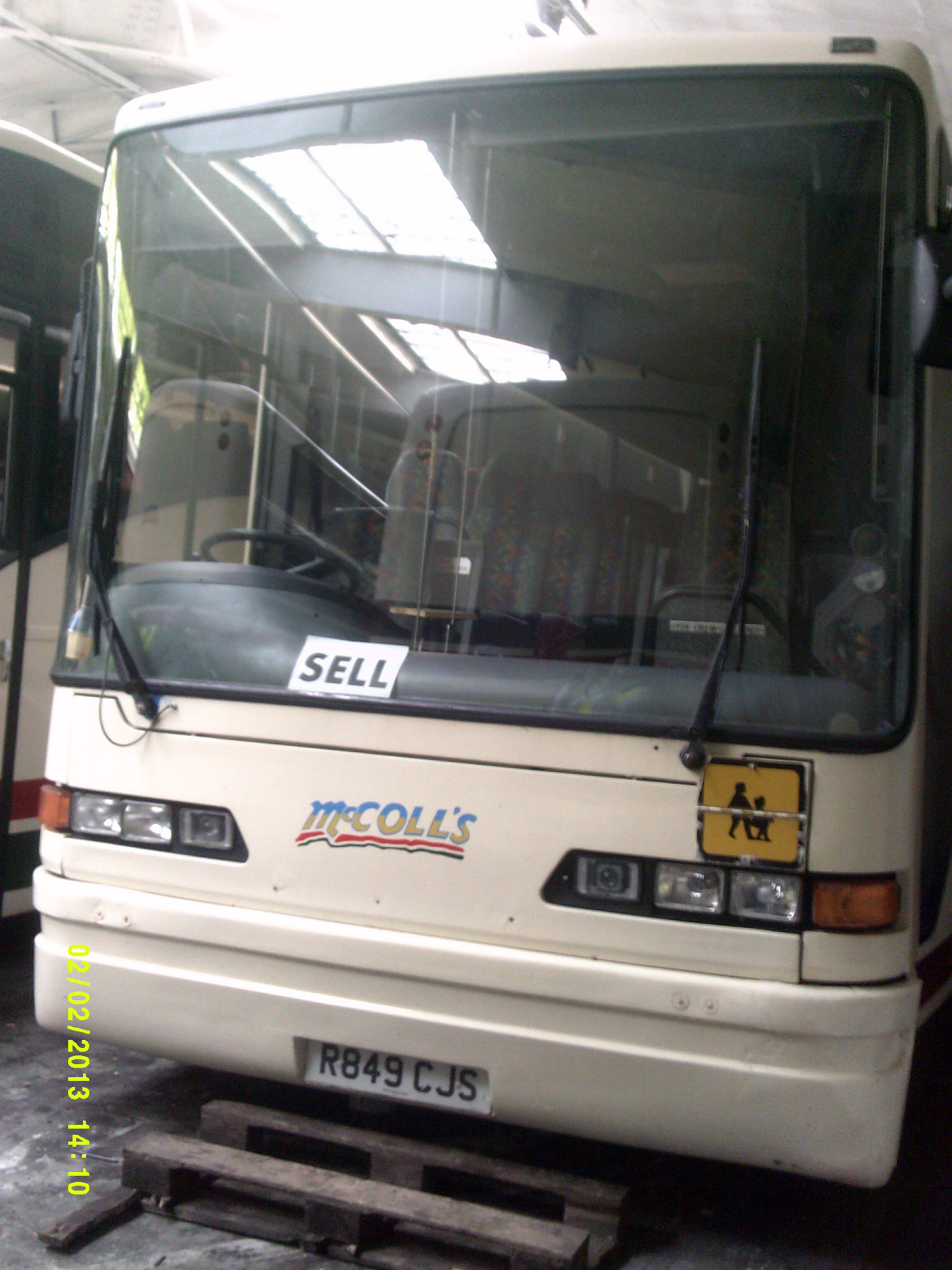 the front end of a bus is seen in this po