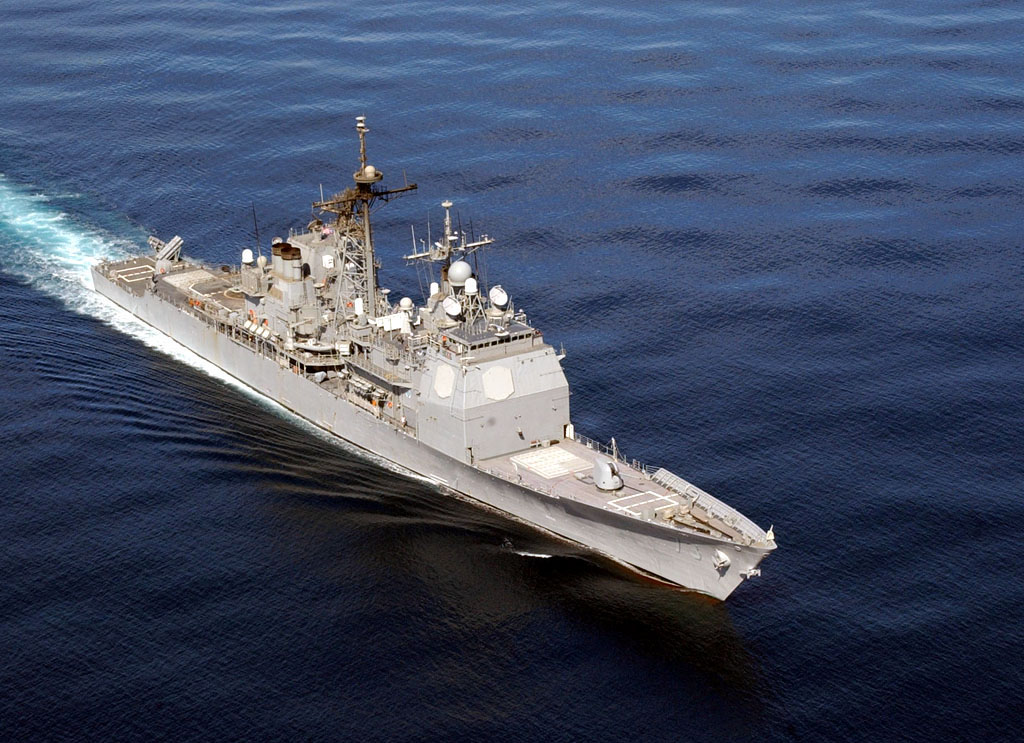 a large military ship floating in the ocean