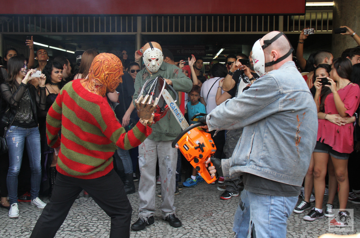 two men in costumes with their faces covered by masks