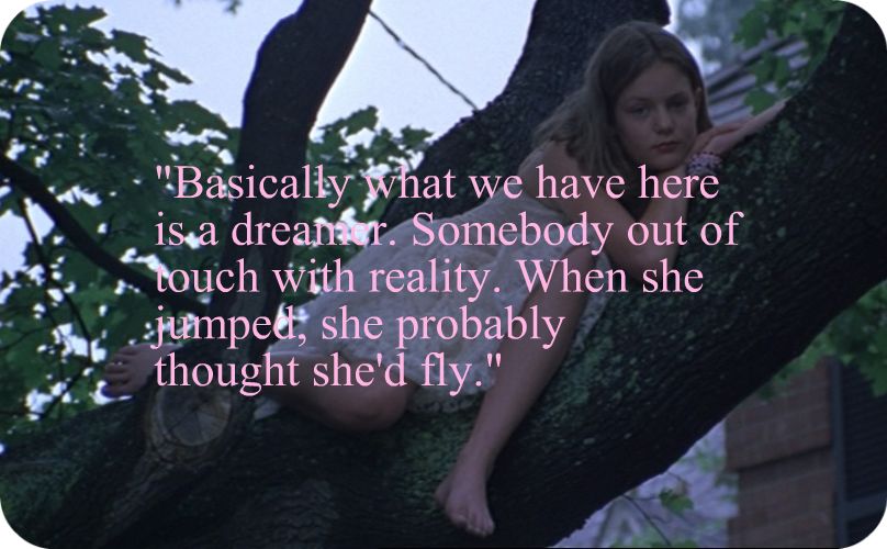 a woman sitting on a tree trunk with a quote about it