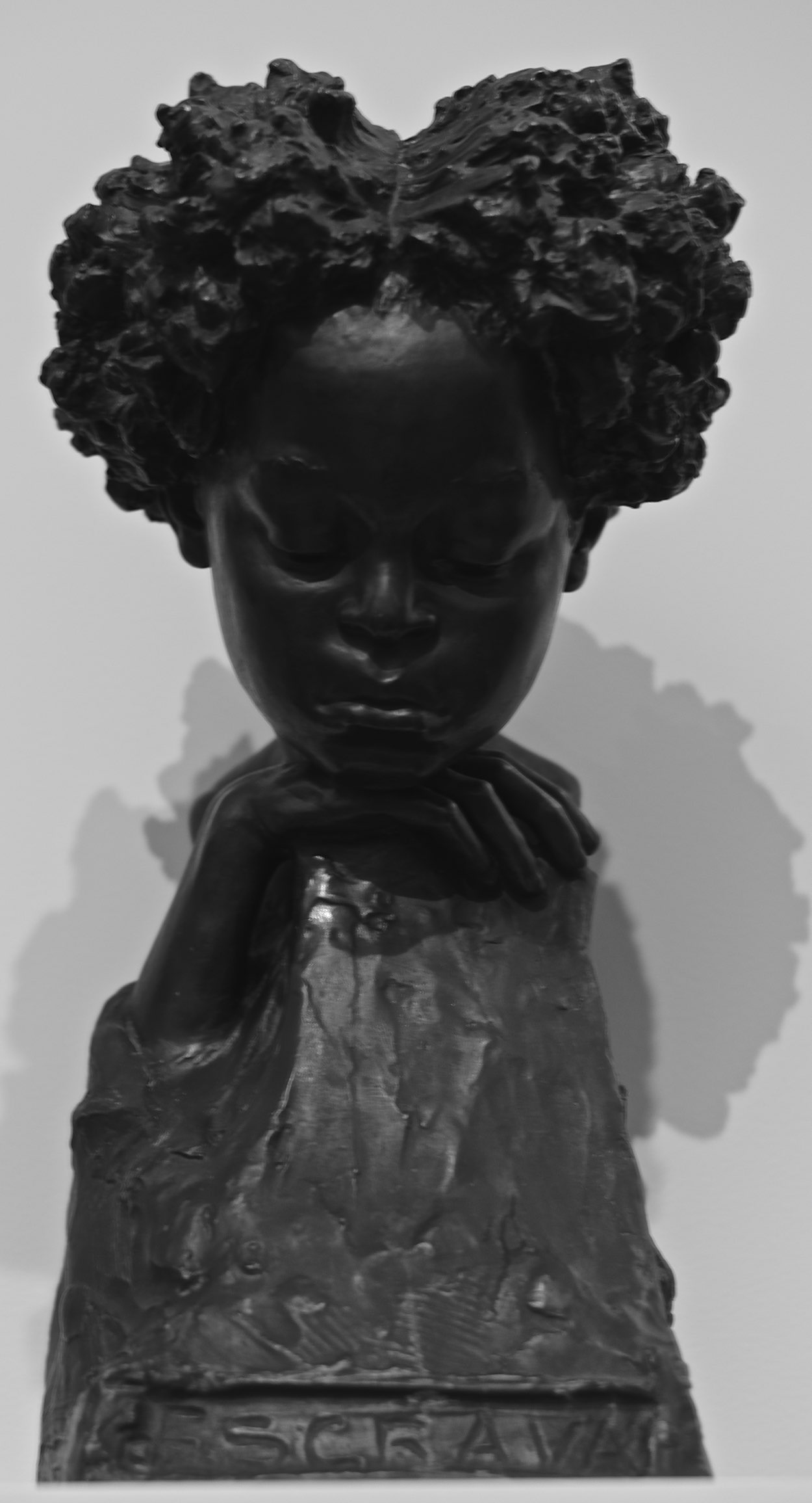 a black and white po of a little child head