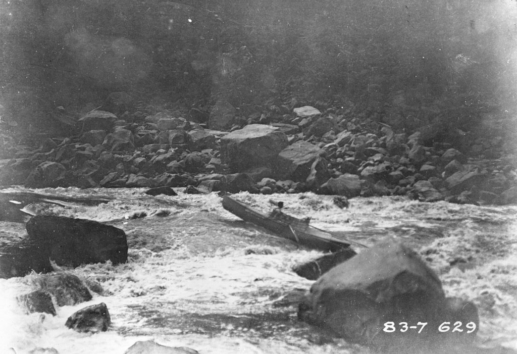 some water some rocks and trees and some rocks