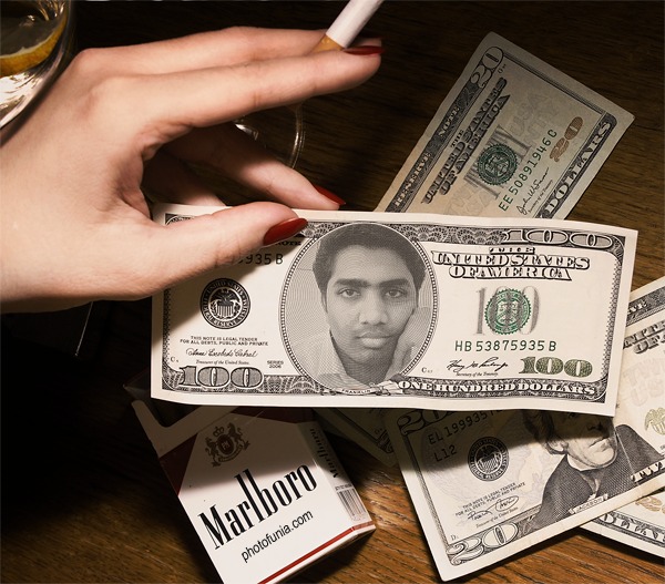 woman's hands hold two stacks of money on top of cigarettes