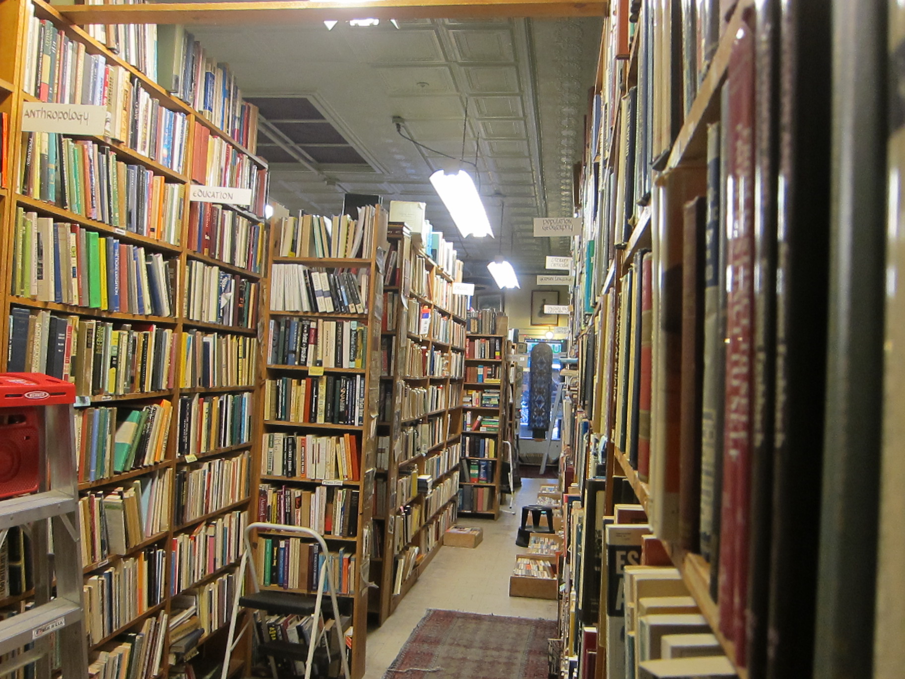 a long liry with a number of books on shelves