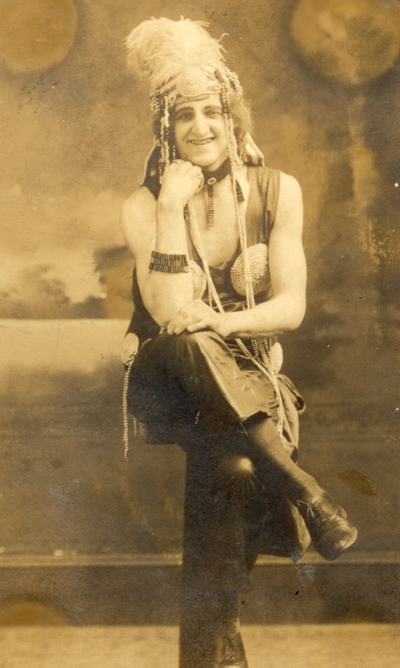 an old fashioned po of a person wearing a costume