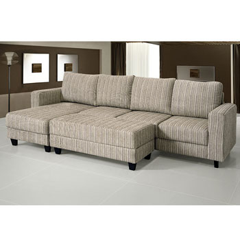 the sectional sofa is sitting on white tile