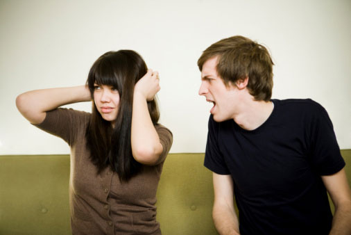 two people talking and one with long black hair