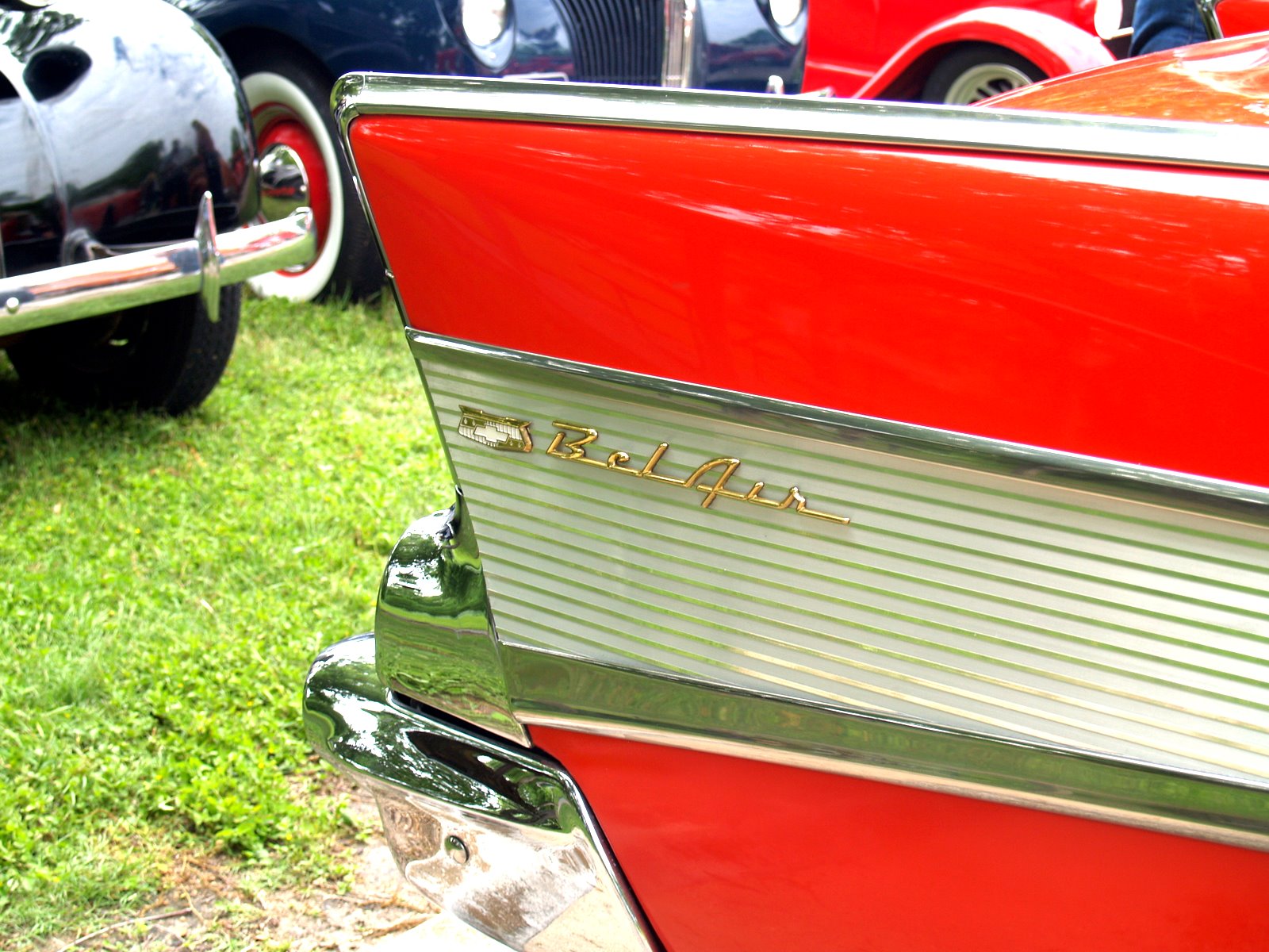 the rear end of an old car with the words relax engraved on it