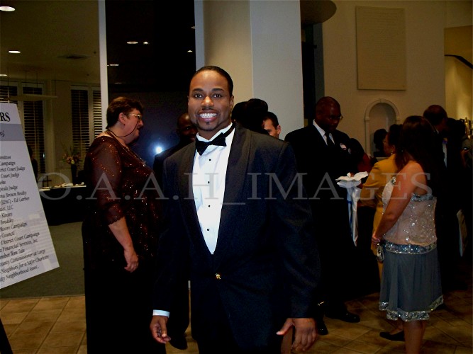 man in a tuxedo at a formal event