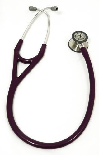 a stethoscope and a pen laying on the ground