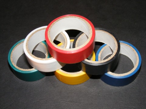 various colored tapes stacked on top of each other