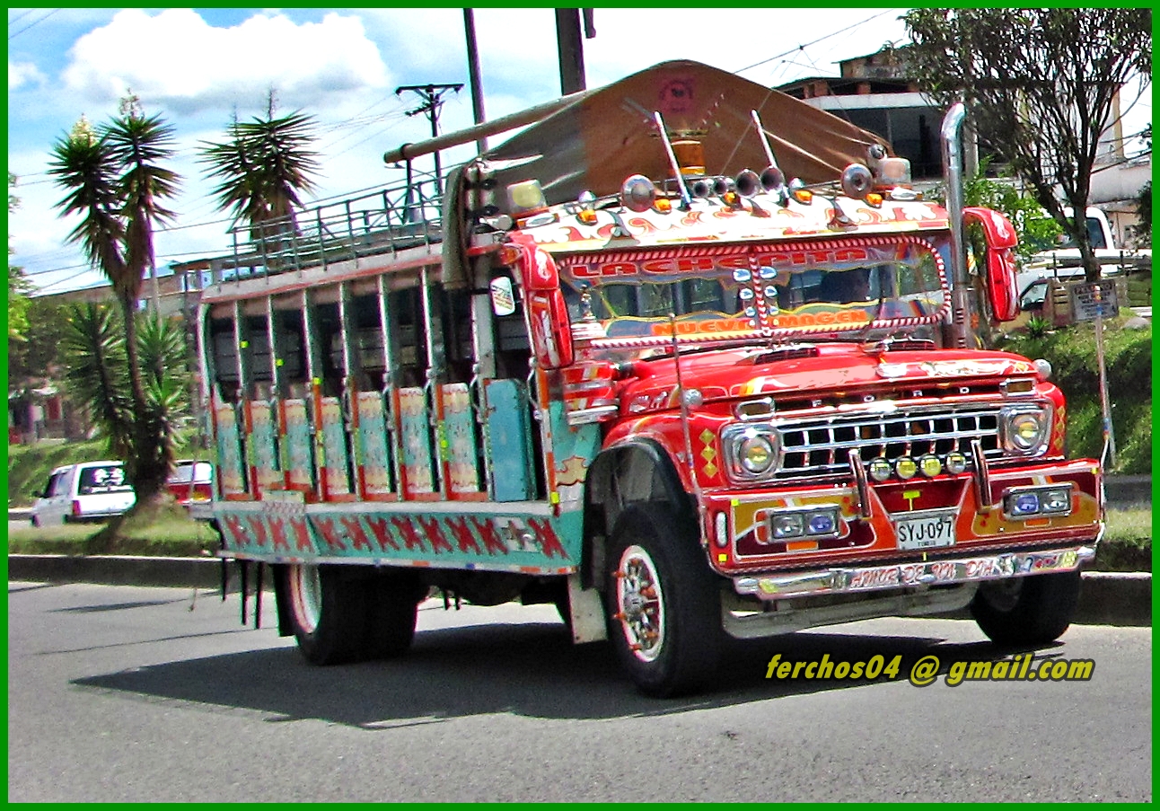 a red truck is decorated with lots of items