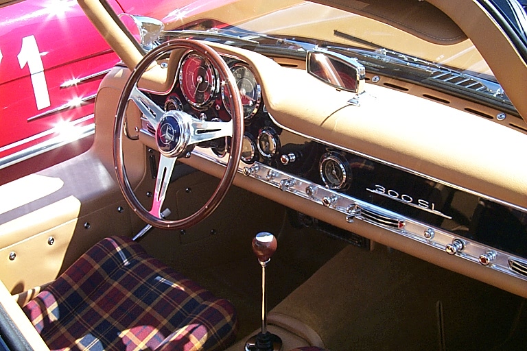 interior of classic car showing dashboard and leather seats