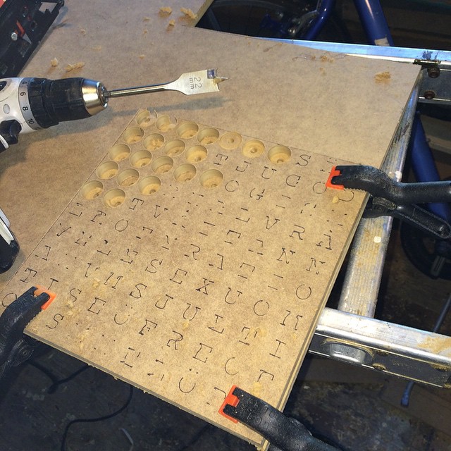 drillers laying across holes in the tray and doughnut tray