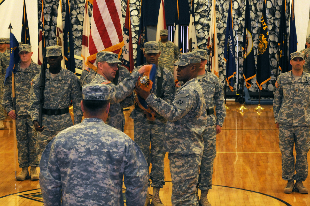 some military personnel raising their medals in the army