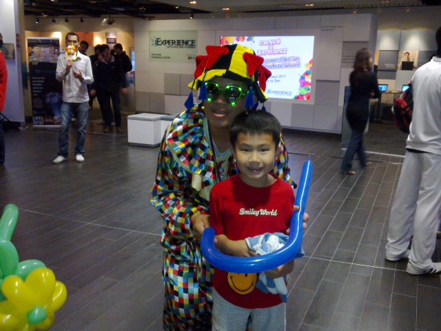 the man and boy are wearing colorful masks