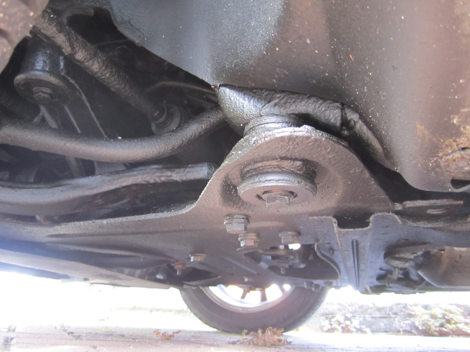 close up image of rear axle and suspension on vehicle