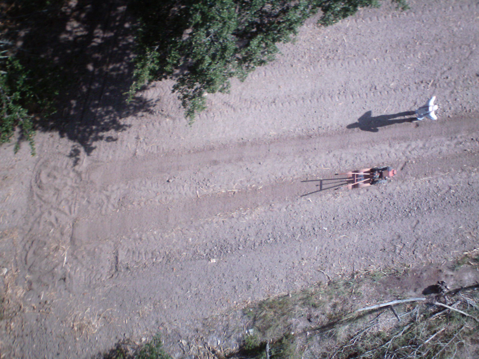 aerial s of two people lying in the dirt