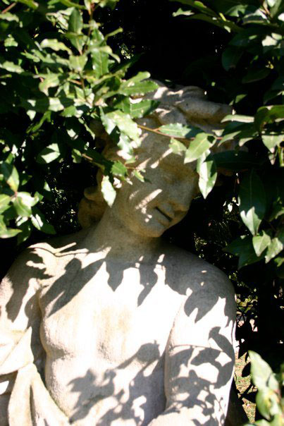 an image of a statue with  underneath