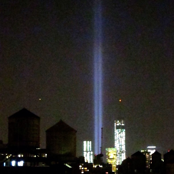 lights illuminate the world's tallest skyscr as seen from across the water