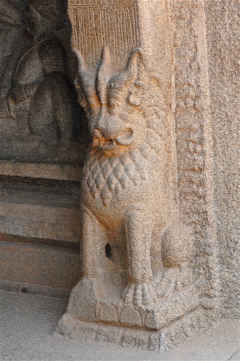 this gargoyle was carved into a column outside the church