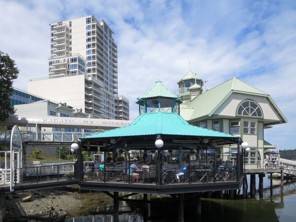 a group of bikes that are sitting on a pier