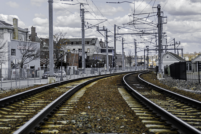 the empty railroad track is shown with no people on it