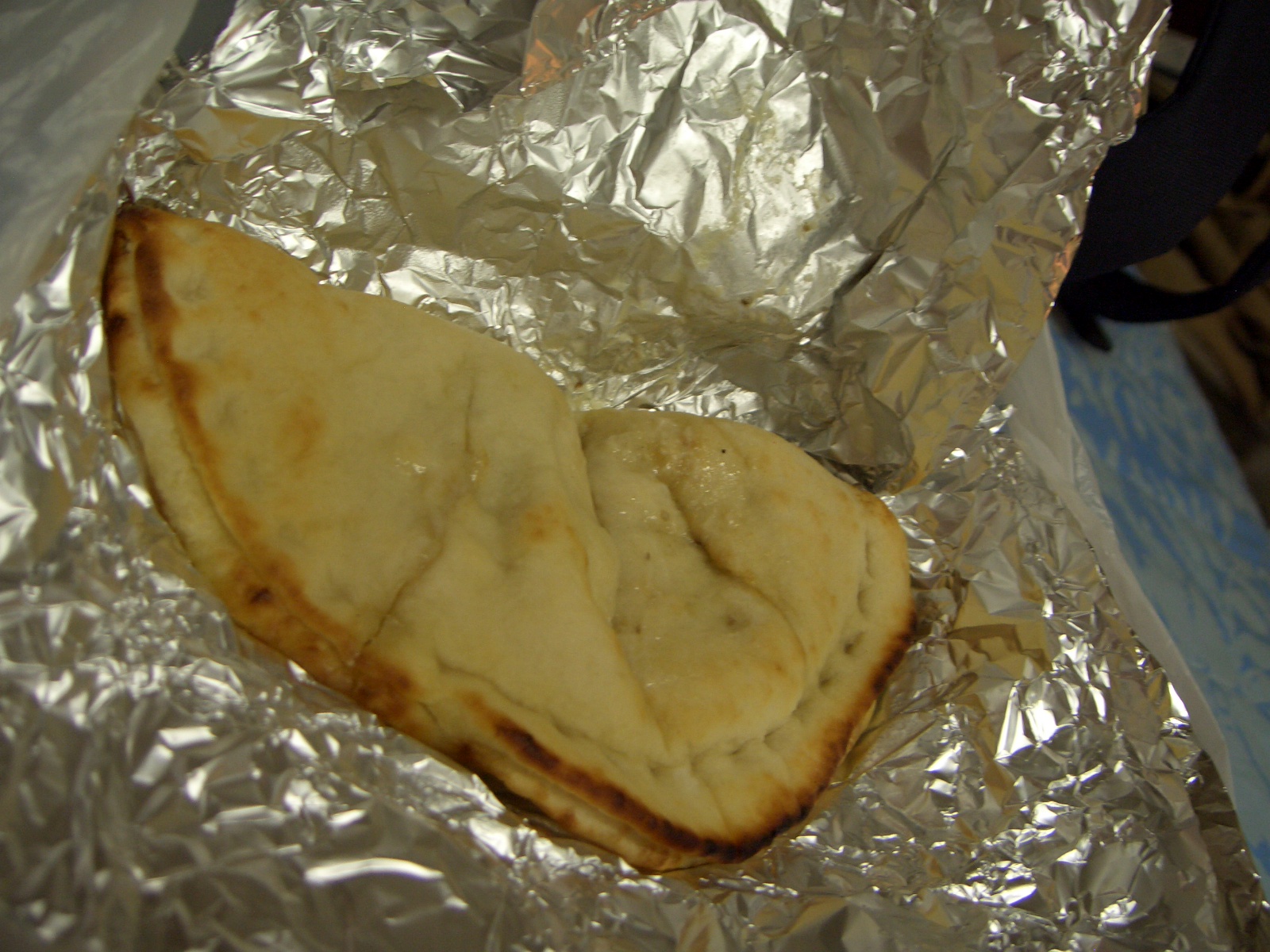 some food laying on top of aluminum foil