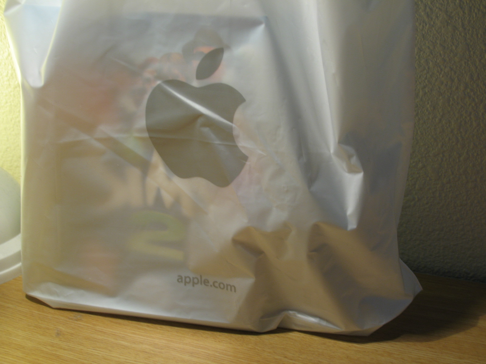 a close up of a bag with an apple logo